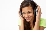 Portrait of Smiling Teenage Girl Listening to Music
