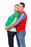 Husband hugging her pregnant wife on white background 
