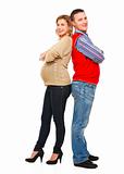 Full length portrait of happy beautiful pregnant woman with husband on white background 
