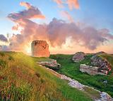 Majestic sunset and ancient fortress ruin