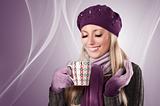 winter girl with a hot cup of tea