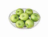 closeup of green apples on plate isolated on white background