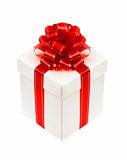 Beautiful white gift box with red ribbon bow isolated on white