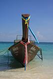 Longtail boat with colorful ribbons