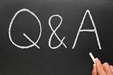 Writing Q&A, Questions and Answers on a blackboard.