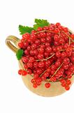 Ceramic cup full of fresh red currant berries. Clipping path included