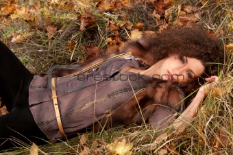 woman lying on the leaves