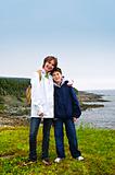 Children standing at Atlantic coast in Newfoundland