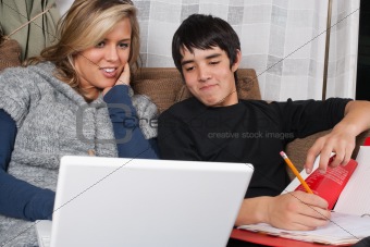Young couple doing schoolwork