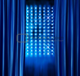 Stage spotlights blue curtains