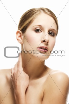 young beautiful woman moving hand to her neck