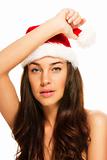 young beautiful christmas woman wearing santas hat