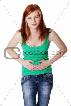 Teen girl having stomachache.
