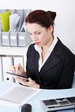 Businesswoman using a tablet.