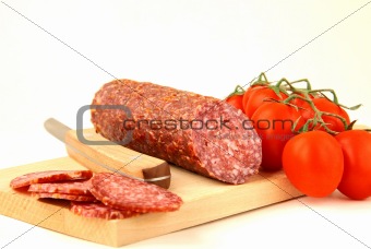 Fresh sausage, salami on white background