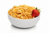Pile of cornflakes on a bowl over white background