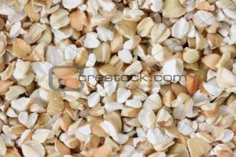Dry raw buckwheat on white background