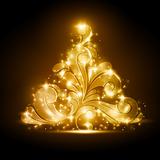 Christmas tree with golden glow and sparkles