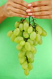 grape in woman hands