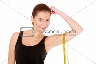 Fitness woman with measure tape