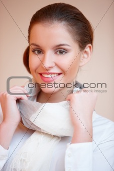Portrait of young sexy brunette woman in white shirt