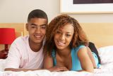 Teenage Couple Together In Bedroom