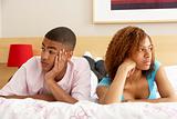 Teenage Couple After Arguement In Bedroom