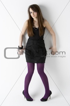 Studio Portrait Of Fashionably Dressed Teenage Girl