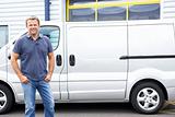 Man standing next to van