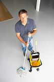 Cleaner mopping office floor