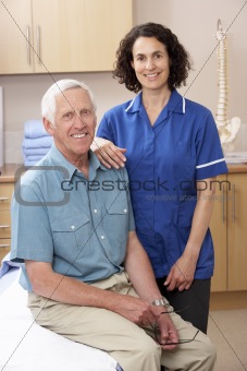 Portrait of male and female osteopath