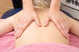Close Up of female masseuse with client