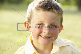 Portrait of young boy in countryside