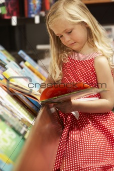 Young girl in bookshop