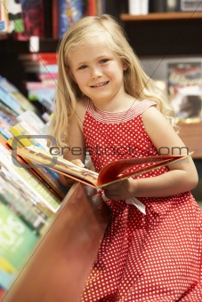 Young girl in bookshop