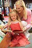 Mother and daughter in bookshop