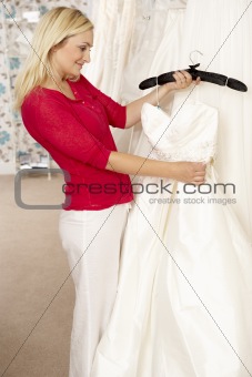 Bride choosing wedding dress