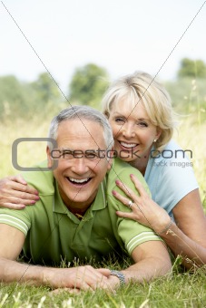 Mature couple having fun in countryside
