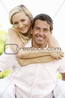 Young couple having fun in countryside