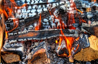 Closeup of a warm fire burning in a fireplace