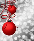 Hanging Ornaments on Blurred Silver Background