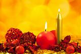 Christmas candles symbol with red leaves