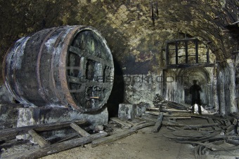 Large barrel and silhouette in the hall.