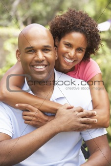 Young Couple Outdoors Hugging