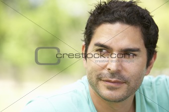 Portrait Of Young Man In Park