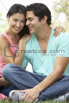 Portrait Of Young Couple In Park