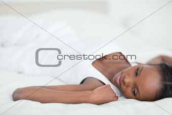 Quiet woman lying on her back