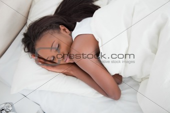Above view of a young woman sleeping