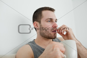 Man taking a pill