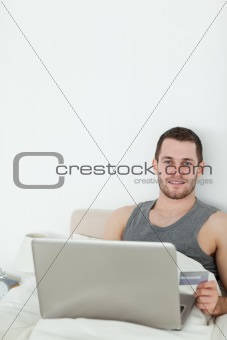 Portrait of a man shopping online